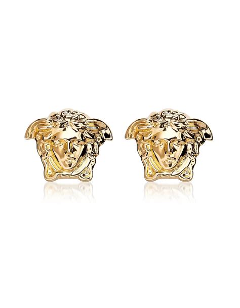 gold versace stud earrings|Versace medusa head earrings.